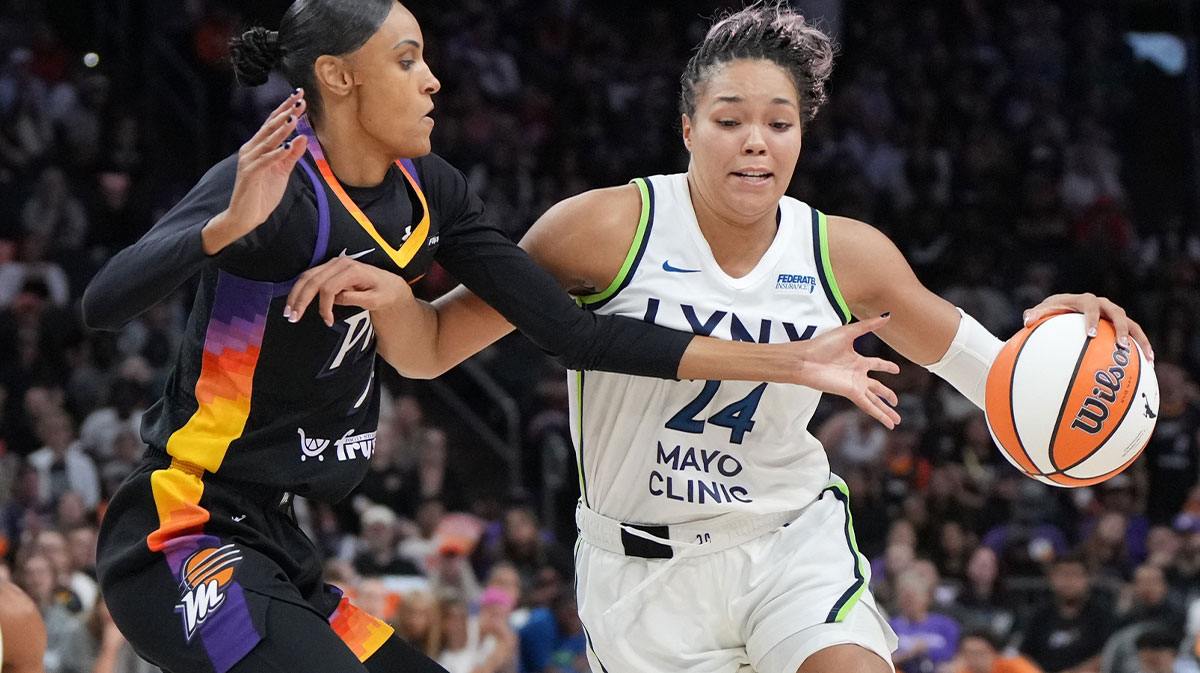 Minnesota Lynx forward Napheesa Collier (24) drives the ball against Phoenix Mercury forward DeWanna Bonner (14) during game three of the second round for the 2025 WNBA Playoffs at PHX Arena.