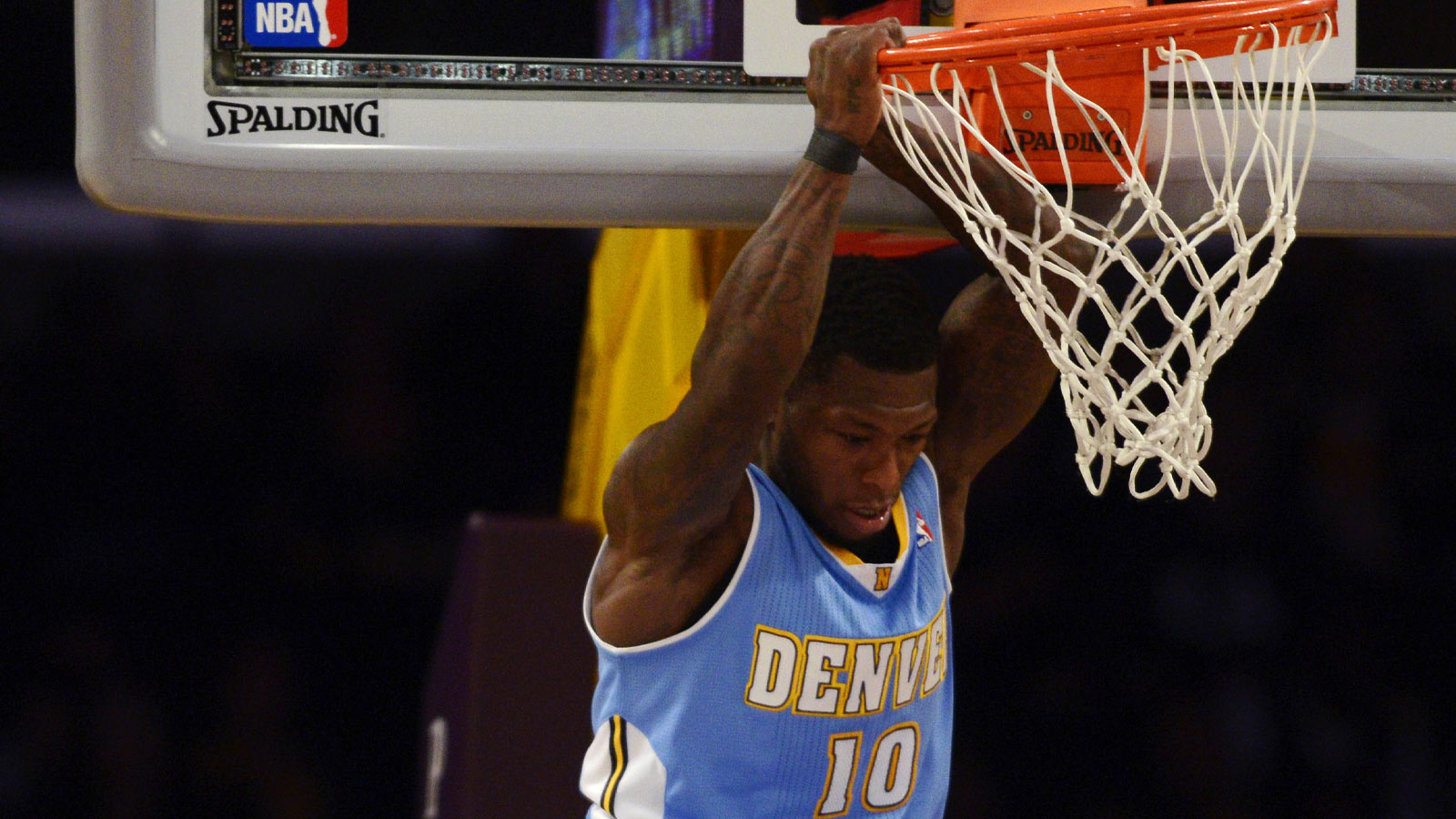 Denver Nuggets guard Nate Robinson (10) dunks the ball against the Los Angeles Lakers during the fourth period at Staples Center. The Denver Nuggets defeated the Los Angeles Lakers 137-115.
