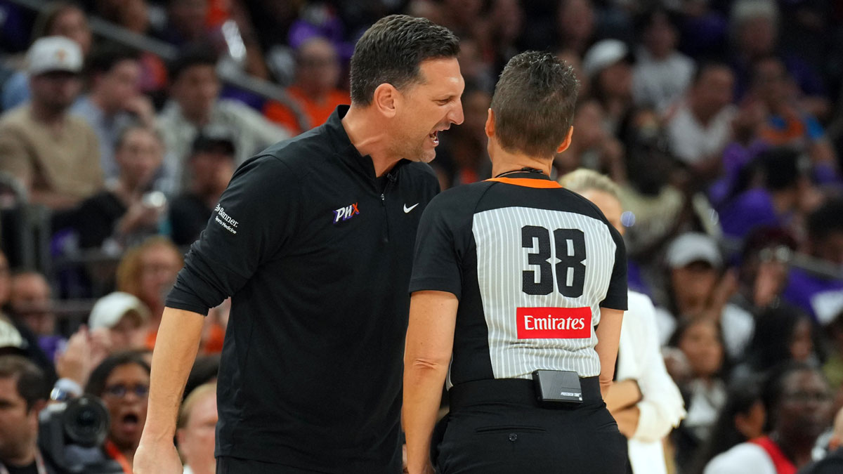 Phoenix Mercury head coach Nate Tibbetts argues with referee Gina Cross (38) and is ejected during the second half of game four against the Las Vegas Aces of the 2025 WNBA Finals at Mortgage Matchup Center.