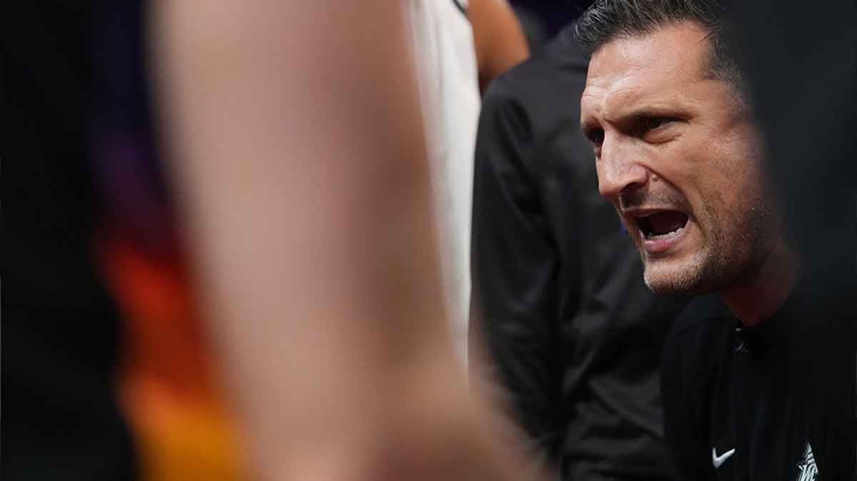 Phoenix Mercury head coach Nate Tibbetts talks to his team on the sidelines as they play the Minnesota Lynx during their WNBA semifinal playoff game at PHX Arena on Sept. 28, 2025.