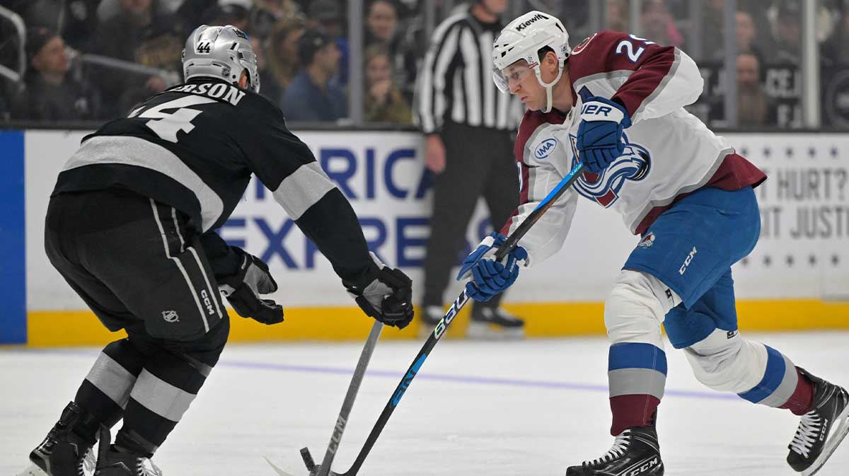 Colorado Avalanche center Nathan MacKinnon (29) gets his shot on goal blocked by Los Angeles Kings defenseman Mikey Anderson (44) during the first period at Crypto.com Arena.