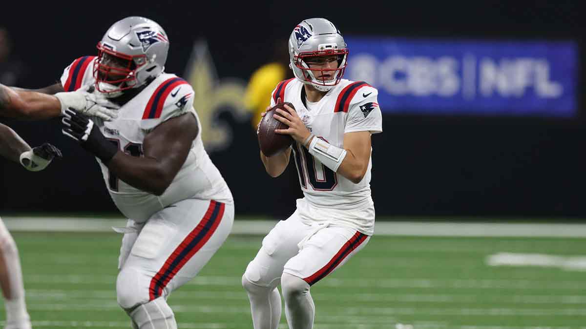 New England Patriots quarterback Drake Maye (10) throws downfield