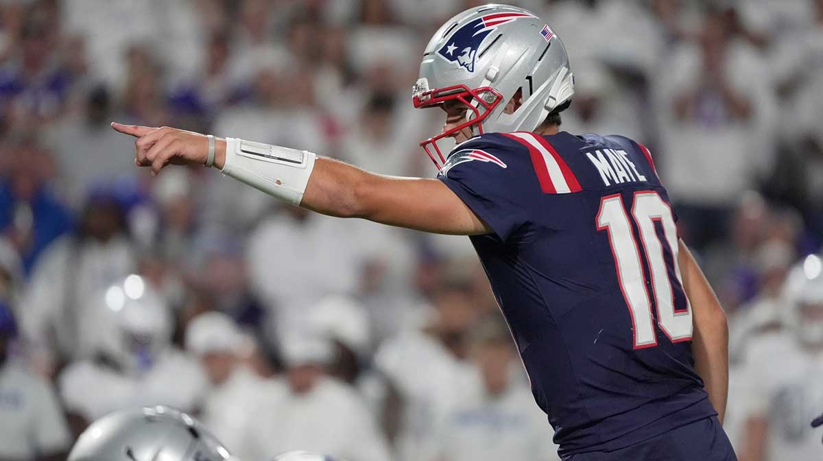 New England Patriots quarterback Drake Maye lets the offense line know what he sees during first half action at Highmark Stadium in Orchard Park on Oct. 5, 2025.
