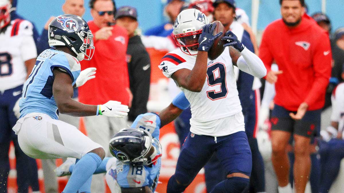 New England Patriots wide receiver Kayshon Boutte (9) runs with the ball against Tennessee Titans