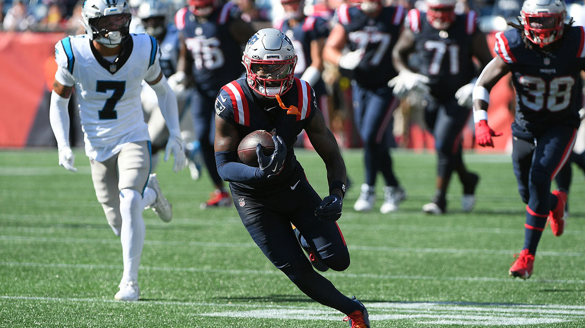 New England Patriots wide receiver Stefon Diggs (8) runs with the ball during the second half against the Carolina Panthers at Gillette Stadium.