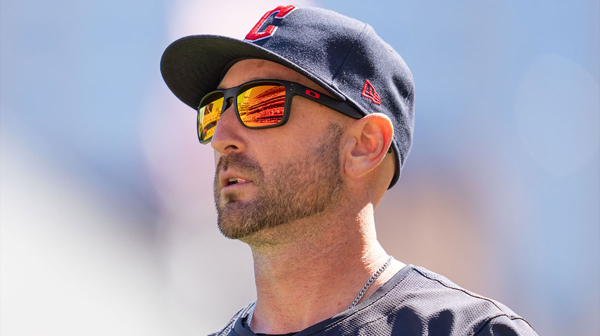 Cleveland Guardians bench coach Craig Albernaz (55) walks to the dugout after meeting with the umpires before the game against the Minnesota Twins at Target Field.