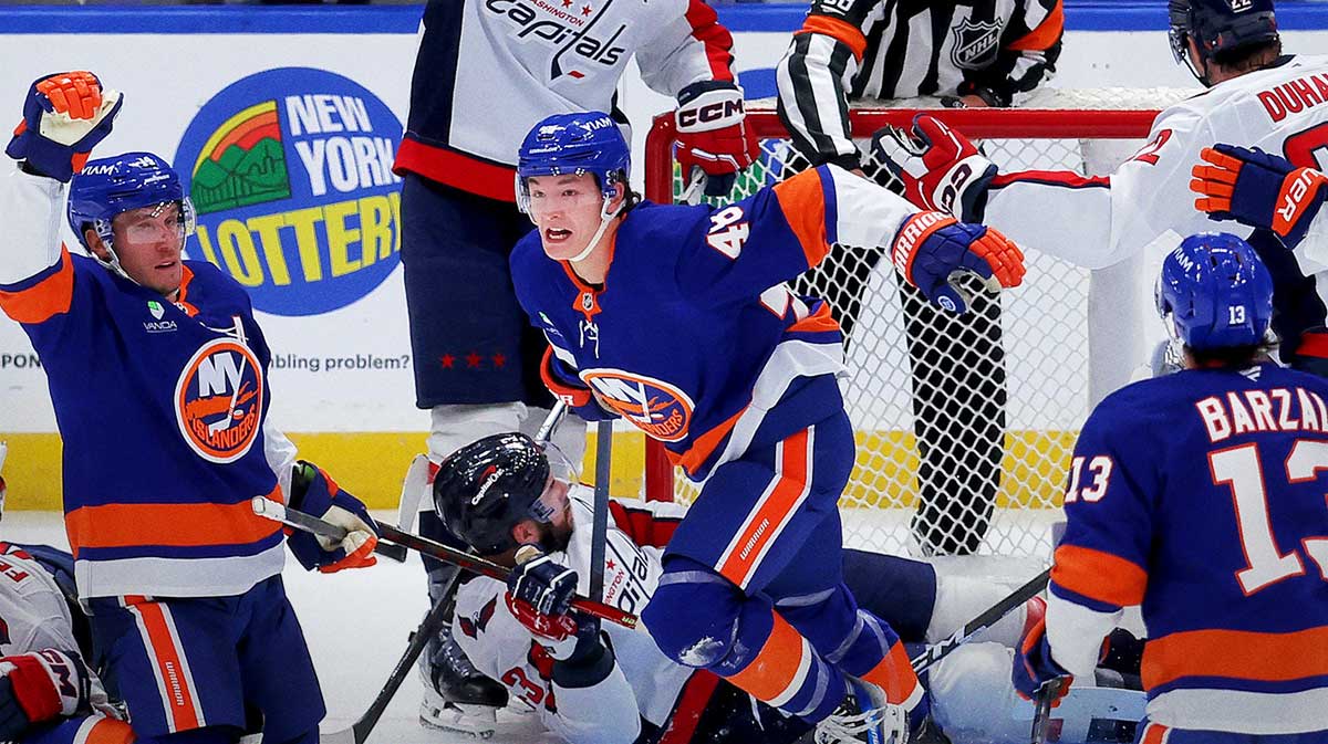 New York Islanders defenseman Matthew Schaefer (48) celebrates his goal against the Washington Capitals during the third period at UBS Arena. The goal was the first of his NHL career.