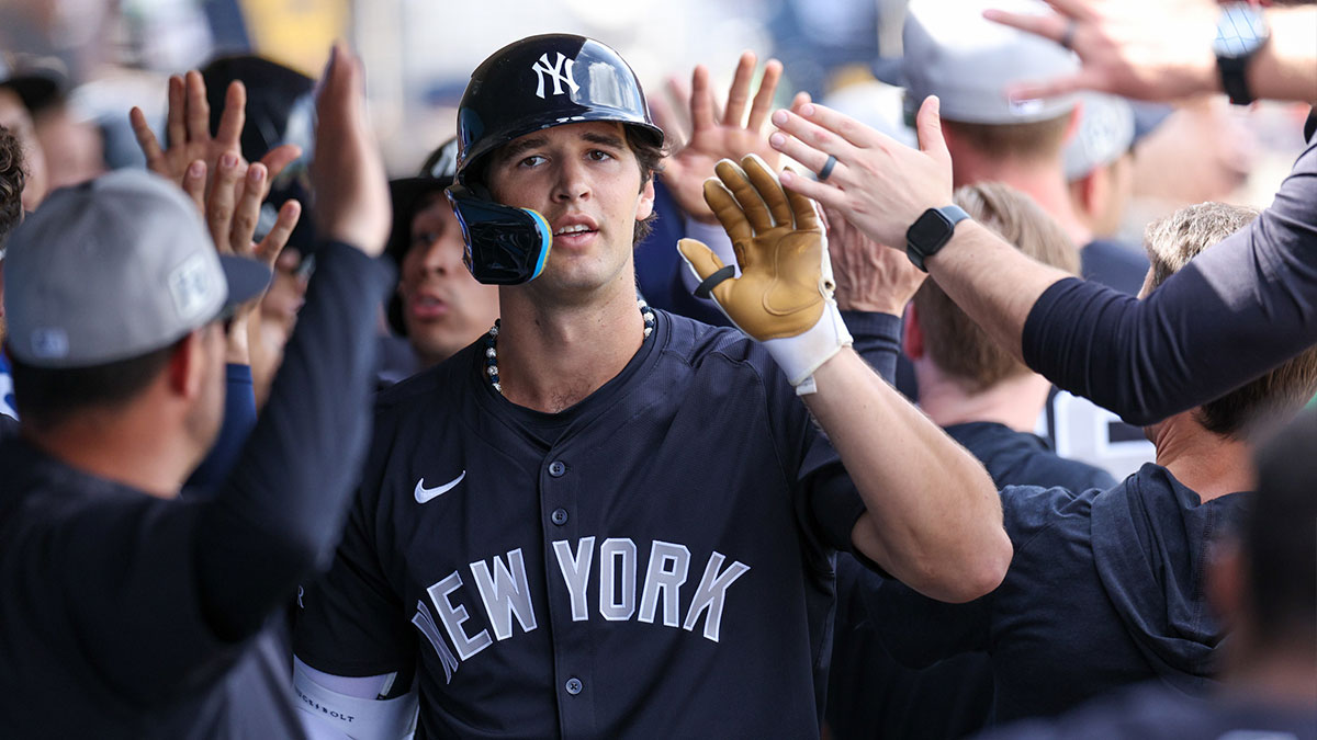 New York Yankees outfielder Spencer Jones (78) celebrates after hitting a three-run home run against the Philadelphia Phillies in the third inning during spring training at BayCare Ballpark.