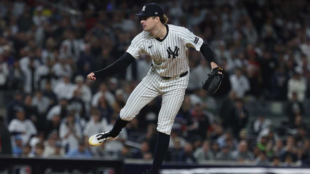 New York Yankees pitcher Cam Schlittler (31) follows through on a pitch in the first inning against the Boston Red Sox during game three of the Wildcard round for the 2025 MLB playoffs at Yankee Stadium.