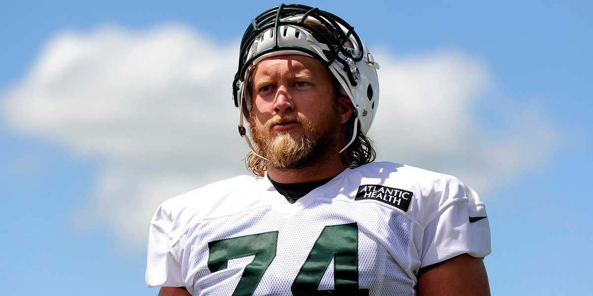 New York Jets center Nick Mangold (74) walks off the field following training camp at SUNY Cortland.