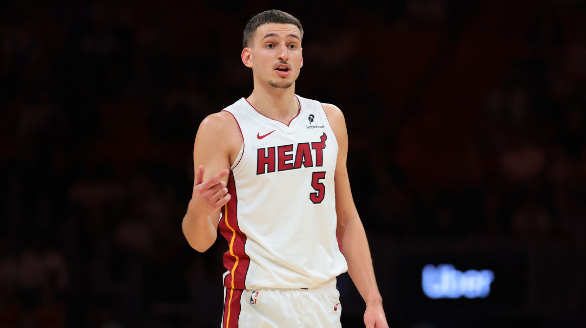 Miami Heat forward Nikola Jovic (5) talks to his teammates against the Milwaukee Bucks during the second quarter at Kaseya Center.