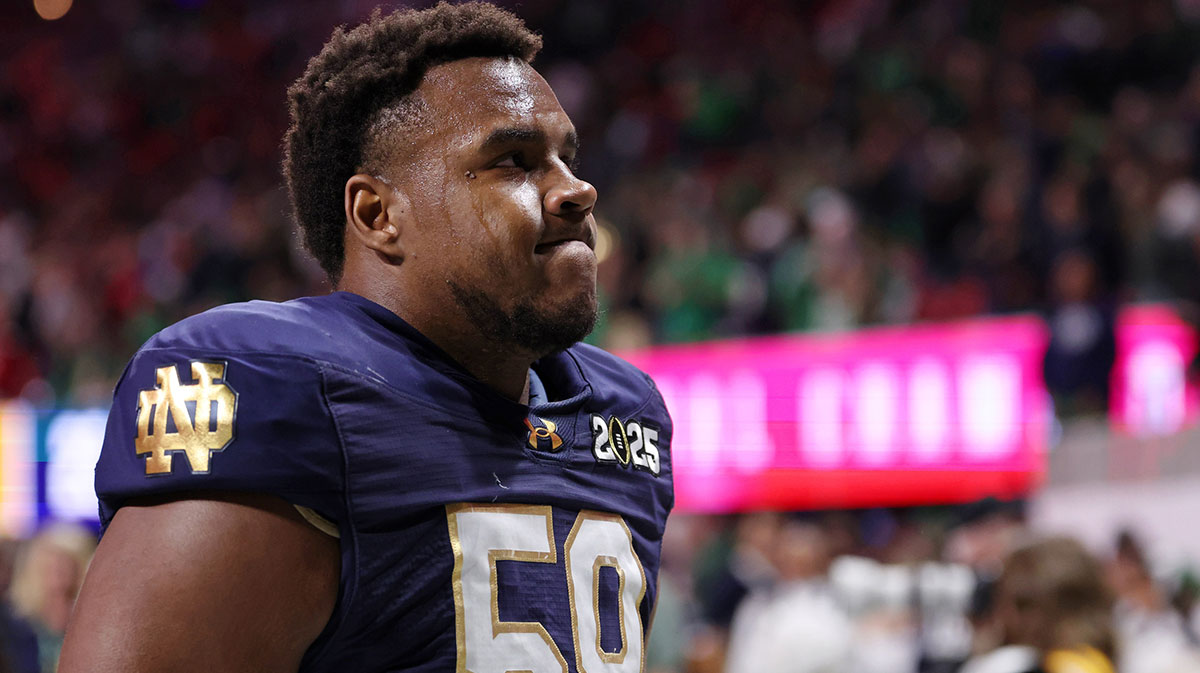 Notre Dame Fighting Irish offensive lineman Aamil Wagner (59) reacts after losing against the Ohio State Buckeyes in the CFP National Championship college football game at Mercedes-Benz Stadium.