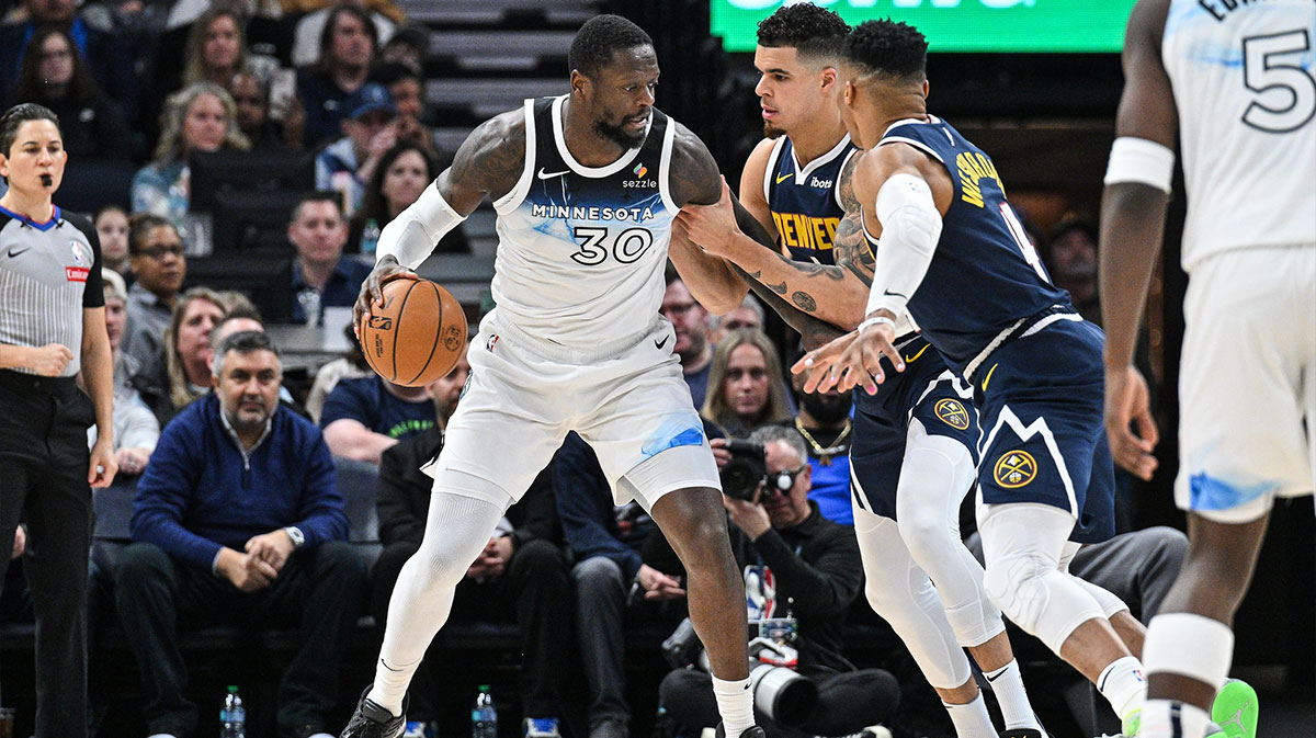 Nuggets forward Michael Porter Jr. (rear) and guard Russell Westbrook (4) during the second quarter at Target Center