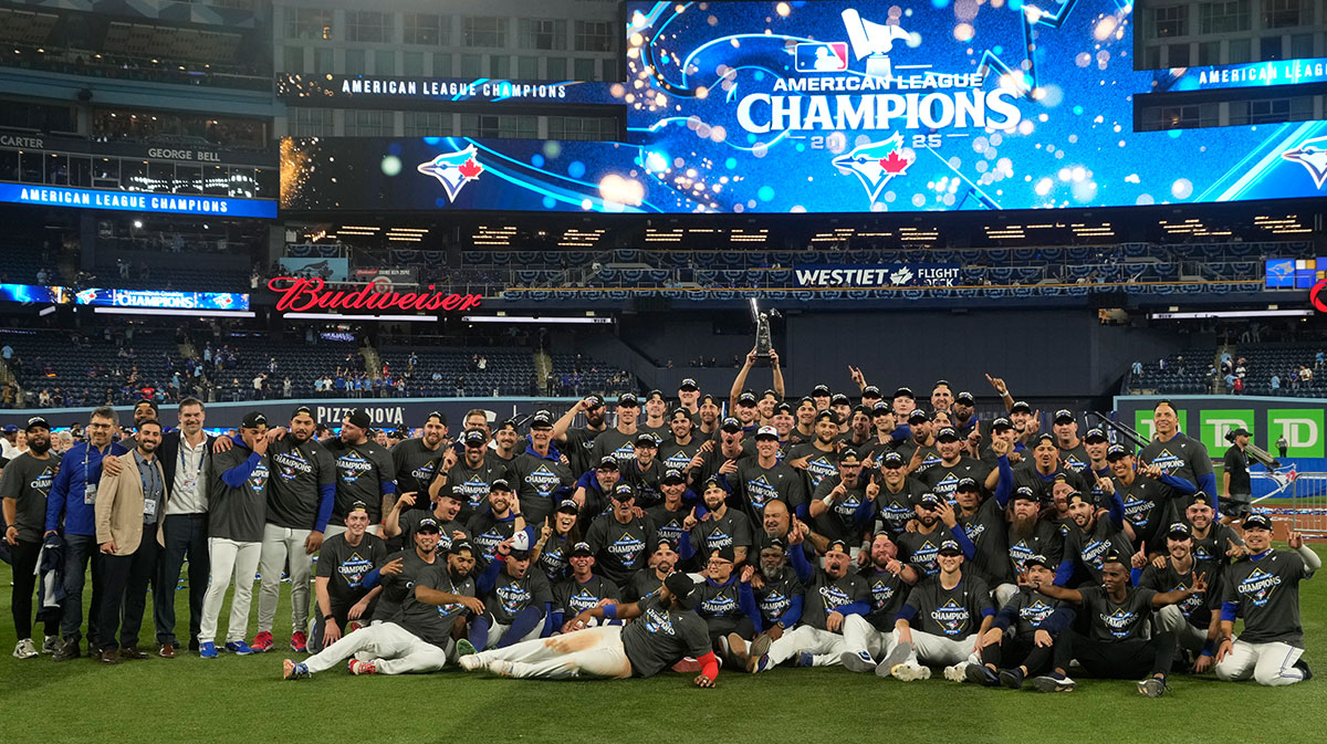 Oct 20, 2025; Toronto, Ontario, CAN; The Toronto Blue Jays celebrate on the field after defeating the Seattle Mariners in game seven of the ALCS round for the 2025 MLB playoffs at Rogers Centre. Mandatory Credit: John E. Sokolowski-Imagn Images