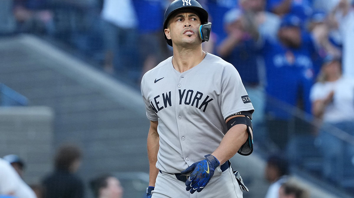 New York Yankees designated hitter Giancarlo Stanton (27) reacts after striking out in the sixth inning against the Toronto Blue Jays during game one of the ALDS round for the 2025 MLB playoffs at Rogers Centre. Mandatory Credit: Nick Turchiaro-Imagn Images