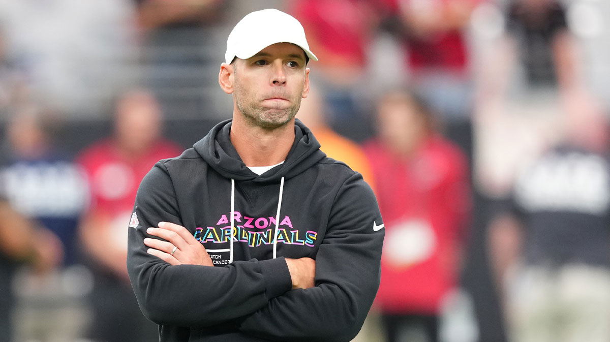Arizona Cardinals head coach Jonathan Gannon stands on the field before their game against the Tennessee Titans at State Farm Stadium.