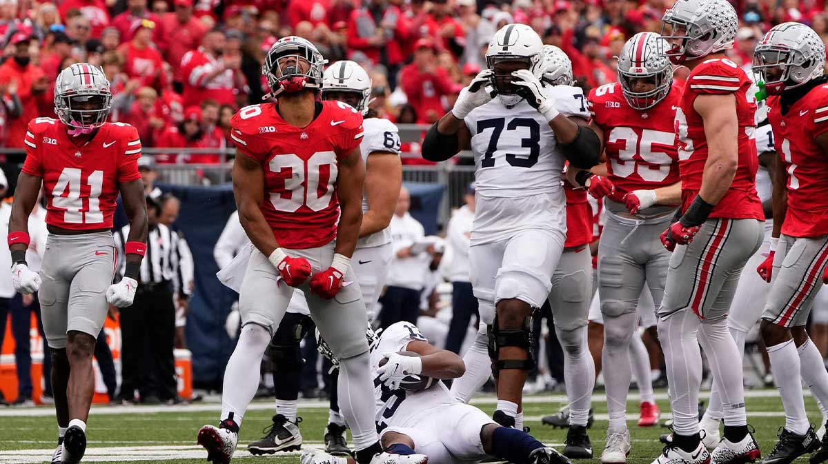 Ohio State linebacker Cody Simon celebrates a tackle of Penn State running back Kaytron Allen.