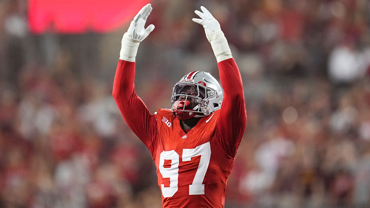Ohio State Buckeyes defensive end Kenyatta Jackson Jr. (97) celebrates a timeout on the first offensive possession by the Minnesota Golden Gophers during the first half of the NCAA football game at Ohio Stadium
