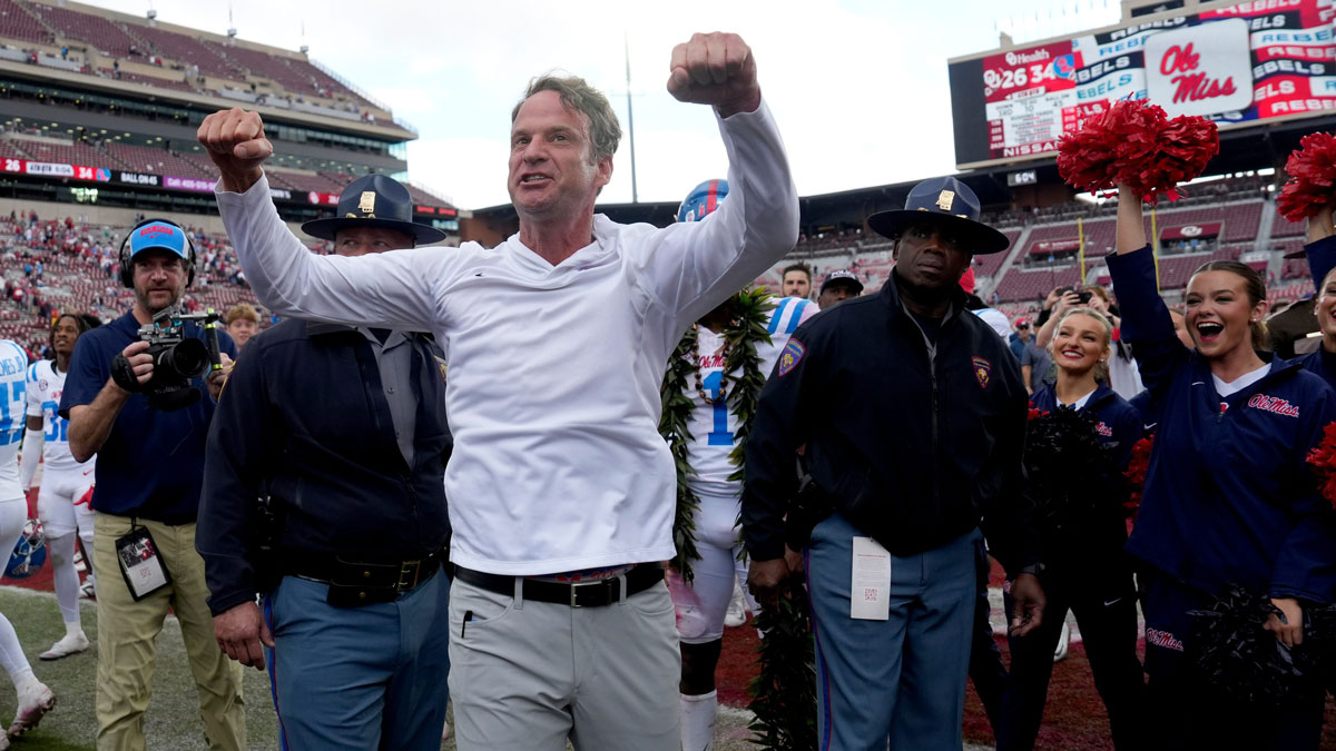 Ole Miss coach Lane Kiffin celebrates after a college football game between the University of Oklahoma Sooners (OU) and the Ole Miss Rebels at Gaylord Family Ð Oklahoma Memorial Stadium