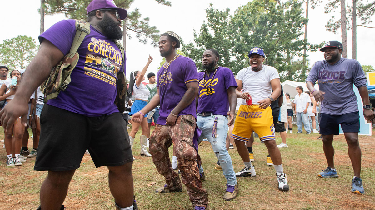 Omega Psi Phi brothers dance in the Argo Village prior to the McKendree vs UWF football game at the University of West Florida in Pensacola on Thursday, Sept. 5, 2024.