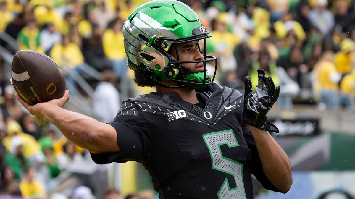 Oregon quarterback Dante Moore throws a pass during warmups as the Oregon Ducks host the Indiana Hoosiers Oct. 11, 2025, at Autzen Stadium in Eugene, Oregon