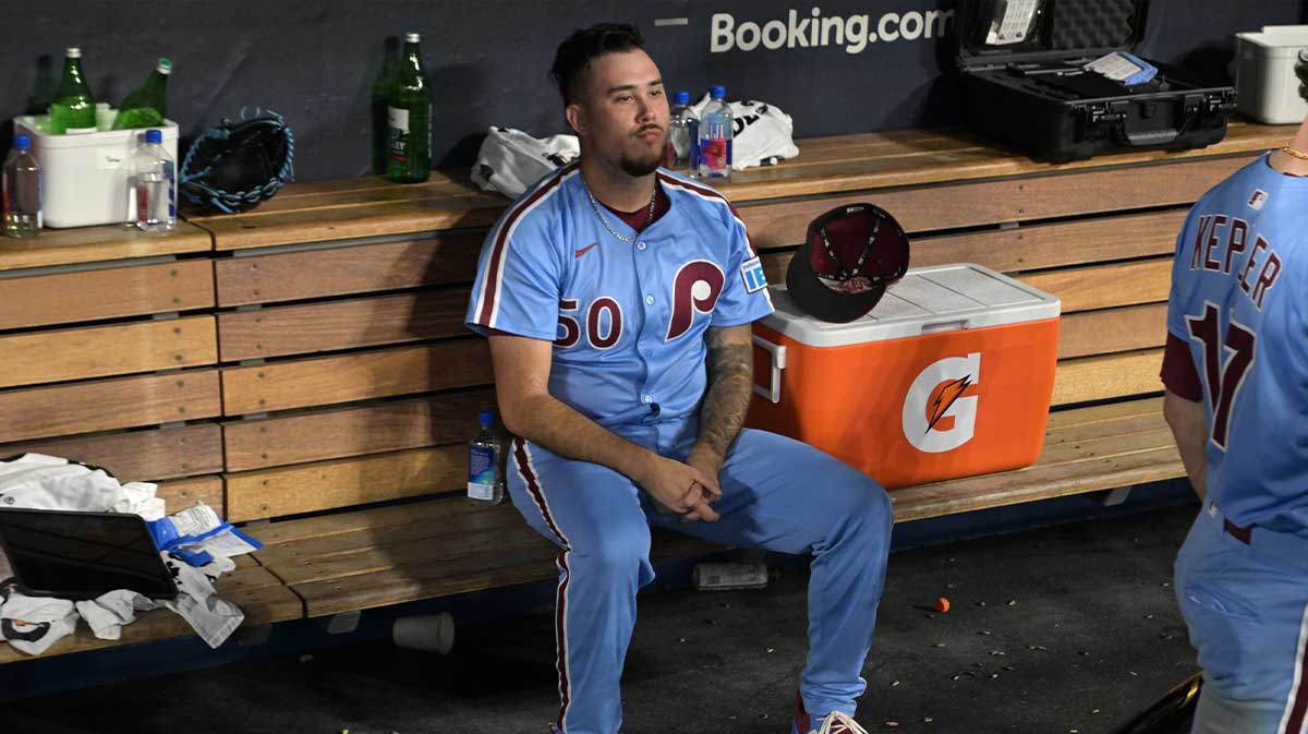 Philadelphia Phillies pitcher Orion Kerkering (50) in the dugout after the final out as they lost to the Los Angeles Dodgers in game four of the NLDS during the 2025 MLB playoffs at Dodger Stadium.