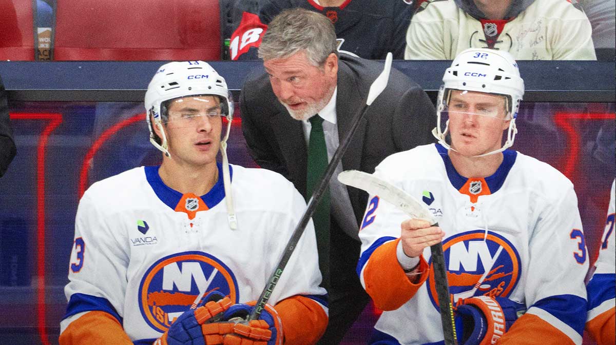 New York Islanders head coach Patrick Roy speaks to center Matthew Barzal (13) in the third period against the Ottawa Senators at the Canadian Tire Centre. Mandatory Credit: Marc DesRosiers-IMAGN Images