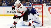 Ottawa Senators left wing Brady Tkachuk (7) skates with the puck in front of Tampa Bay Lightning goaltender Andrei Vasilevskiy (88) during the second period at Benchmark International Arena