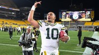 Green Bay Packers quarterback Jordan Love (10) celebrates defeating the Pittsburgh Steelers at Acrisure Stadium.