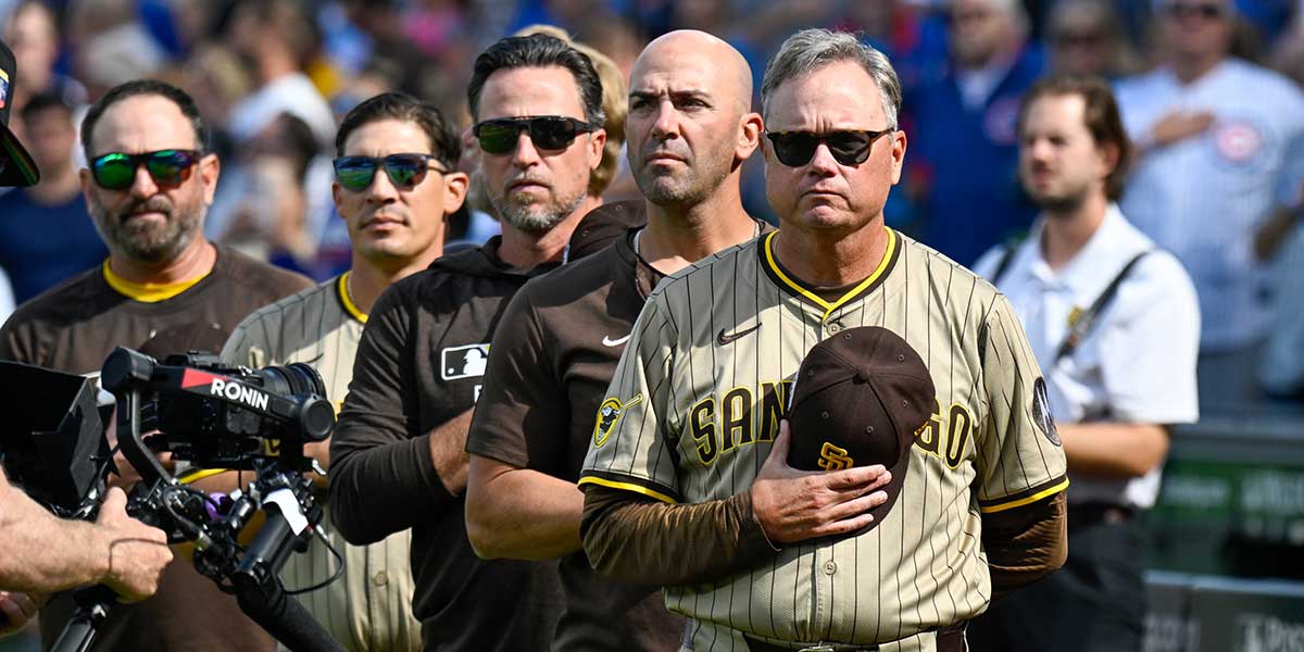 San Diego Padres manager Mike Shildt (8) stands during the National Anthem prior to the game against the Chicago Cubs during game two of the Wildcard round for the 2025 MLB playoffs at Wrigley Field.