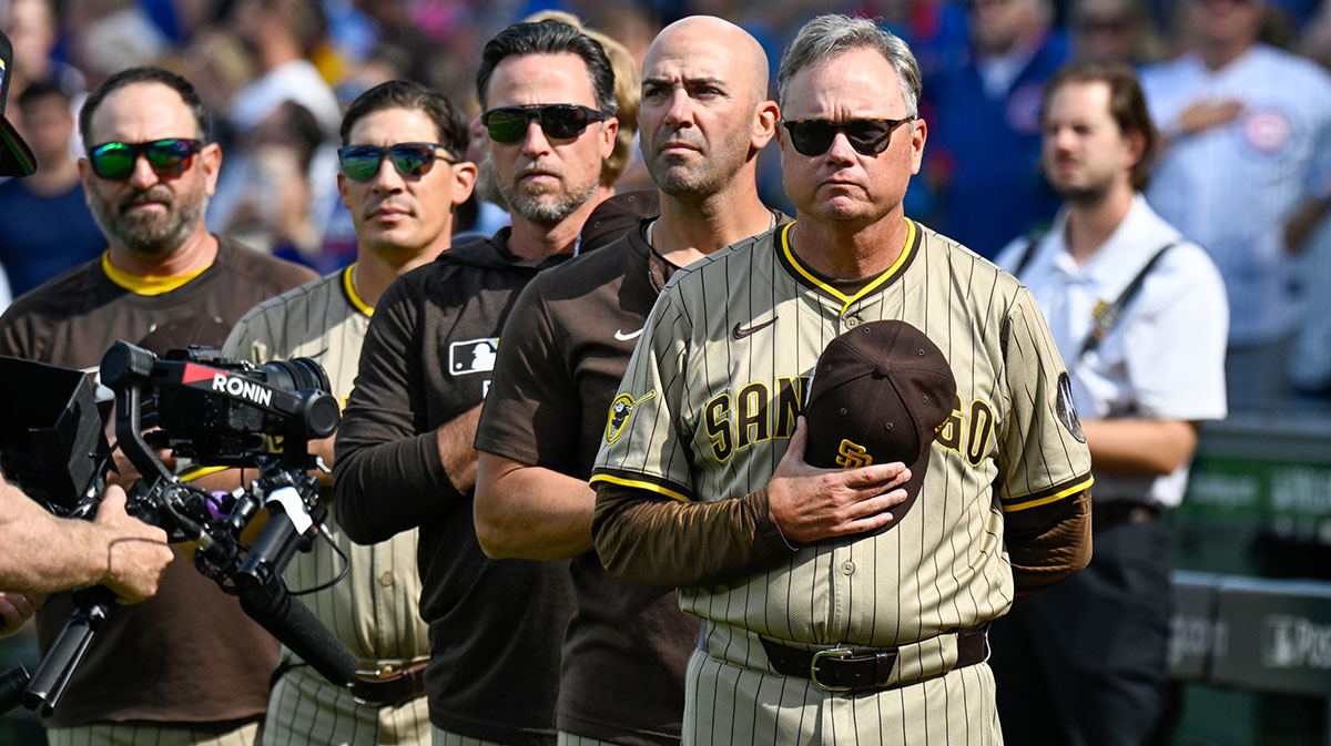 San Diego Padres manager Mike Shildt (8) stands during the National Anthem prior to the game against the Chicago Cubs during game two of the Wildcard round for the 2025 MLB playoffs at Wrigley Field.