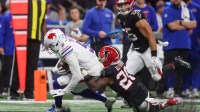 Buffalo Bills wide receiver Josh Palmer (5) is tackled by. Atlanta Falcons cornerback Dee Alford (20) during the first half of a game at Mercedes-Benz Stadium.