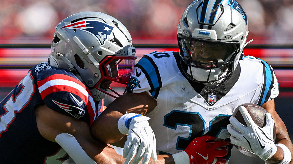 New England Patriots linebacker Christian Elliss (53) tackles Carolina Panthers running back Chuba Hubbard (30) during the second half at Gillette Stadium.