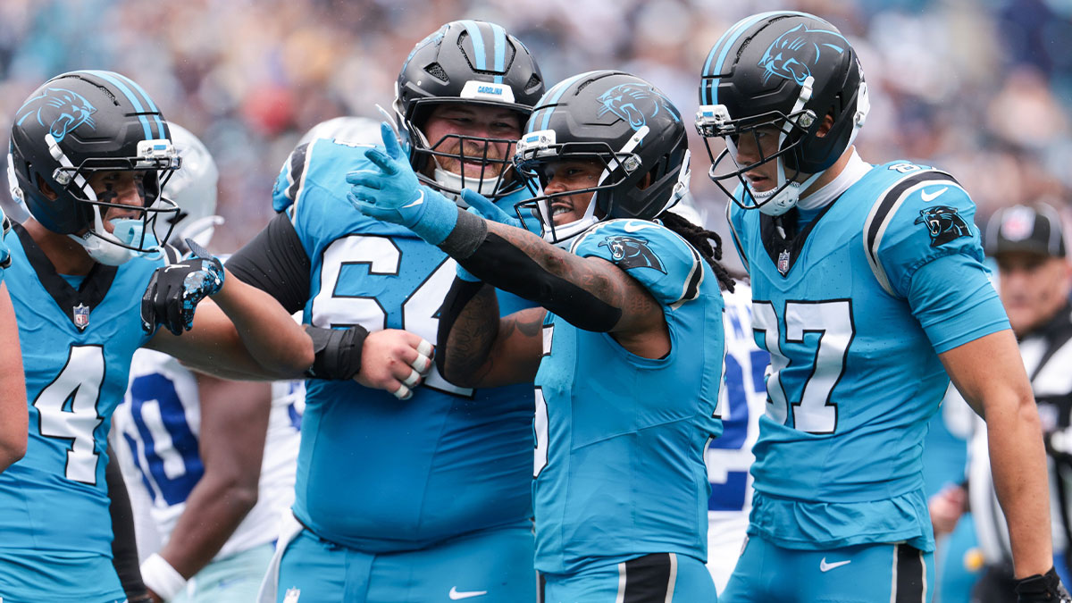 Carolina Panthers running back Rico Dowdle (5) celebrates a first down during the second half against the Dallas Cowboys at Bank of America Stadium.