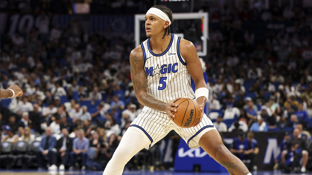 Orlando Magic forward Paolo Banchero (5) looks to shoot the ball against the Miami Heat in the third quarter at Kia Center.