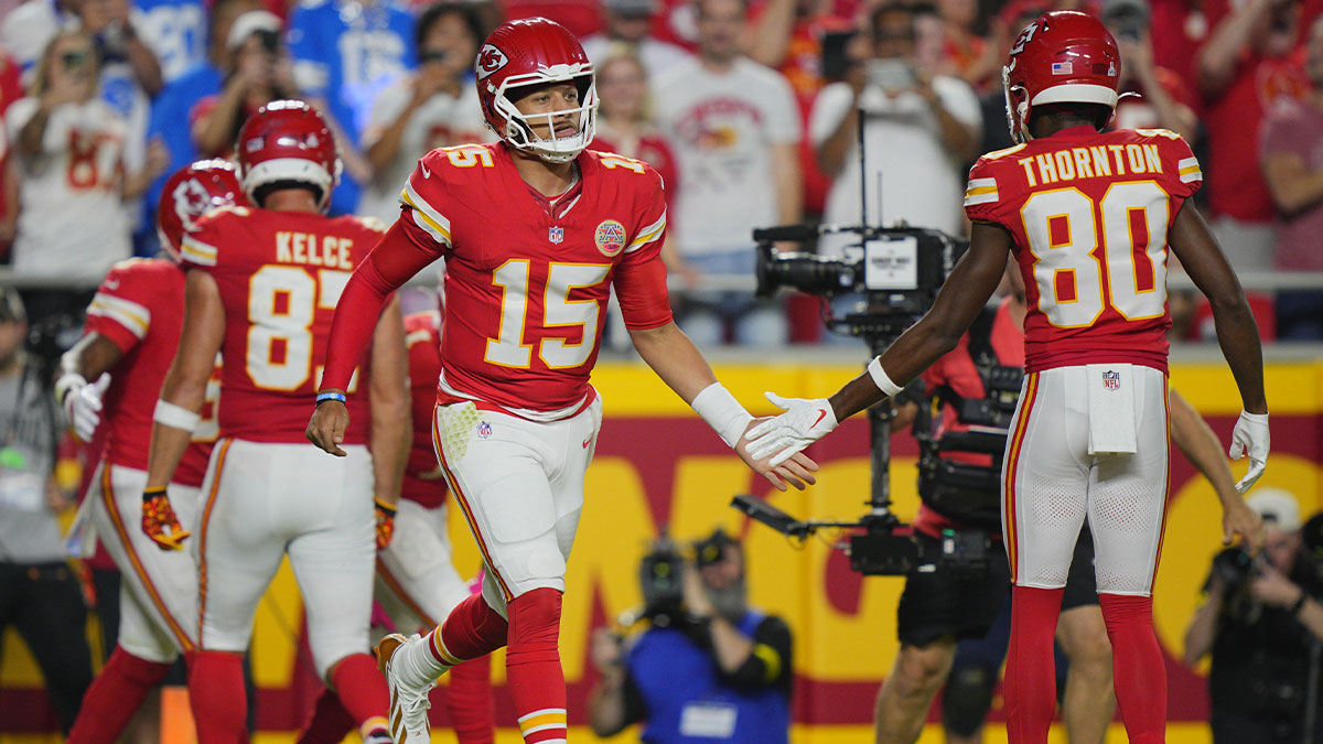 Kansas City Chiefs quarterback Patrick Mahomes (15) reacts after a touchdown against the Detroit Lions during the first half at GEHA Field at Arrowhead Stadium.