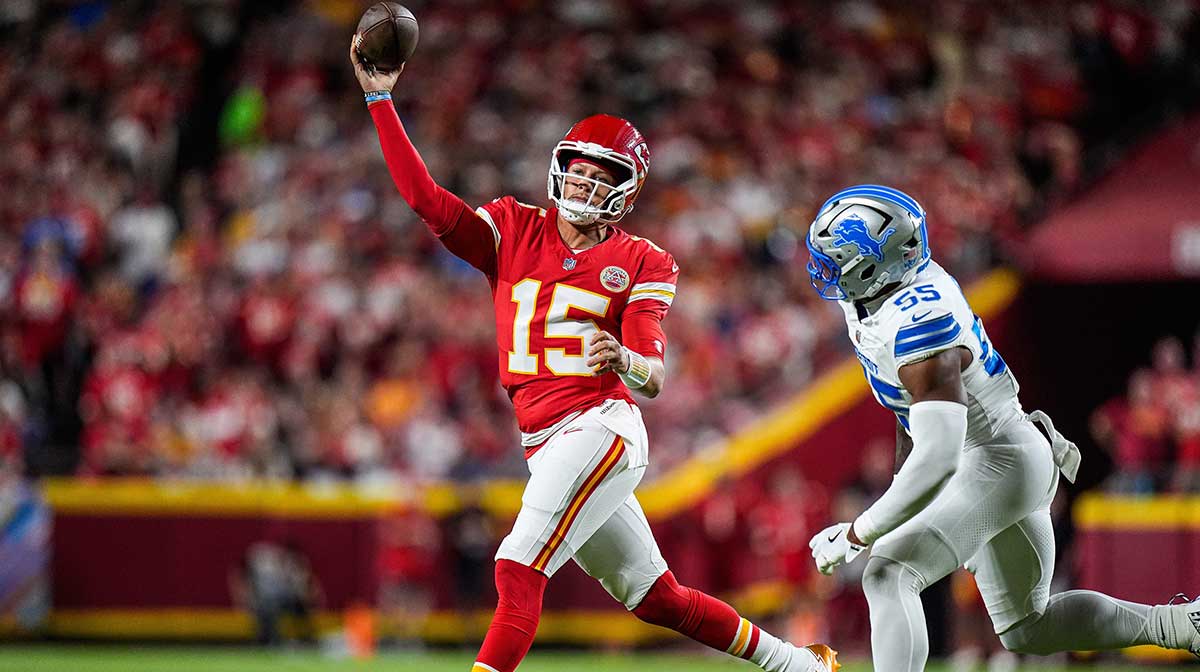 Detroit Lions linebacker Derrick Barnes (55) pressures Kansas City Chiefs quarterback Patrick Mahomes (15) during the first half at Arrowhead Stadium