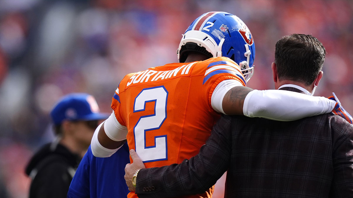 Denver Broncos cornerback Pat Surtain II (2) leaves the field after an injury in the first quarter against the Denver Broncos at Empower Field at Mile High.