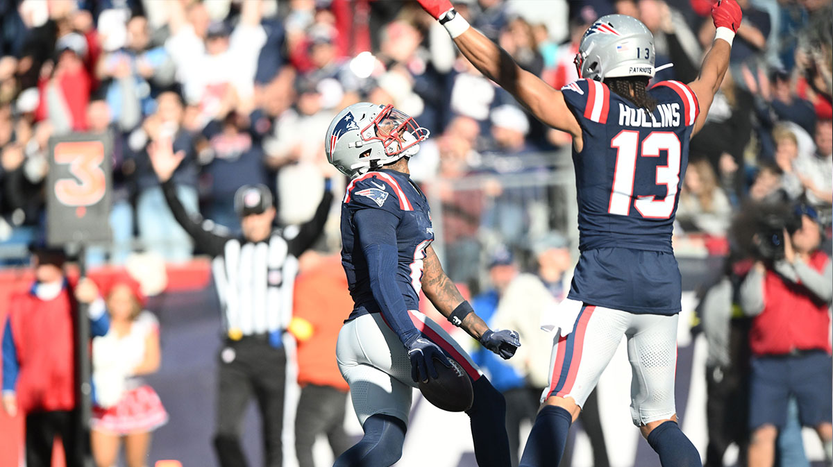 New England Patriots wide receiver Stefon Diggs (8) celebrates scoring a touchdown with wide receiver Mack Hollins (13) during the third quarter against the Cleveland Browns at Gillette Stadium.