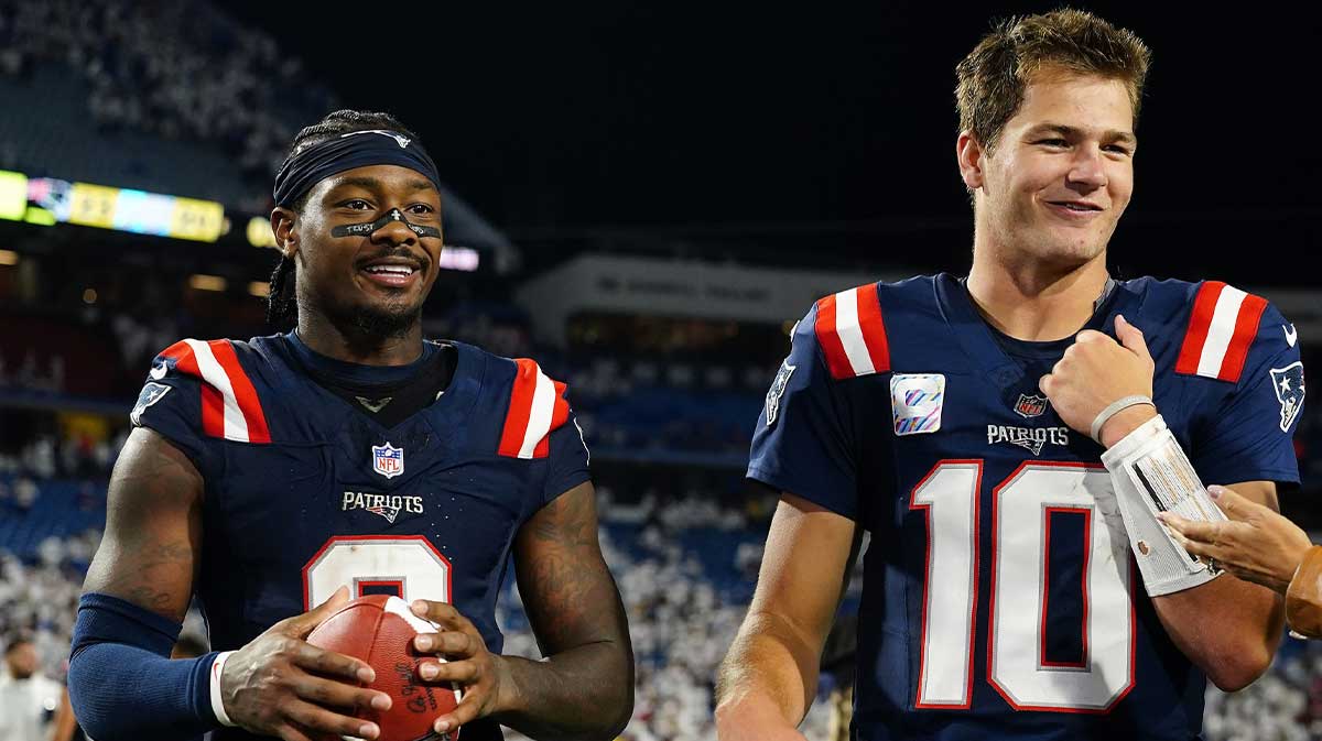 Patriots quarterback Drake Maye (10) and wide receiver Stefon Diggs (8) walks off the field against the Buffalo Bills after the game at Highmark Stadium