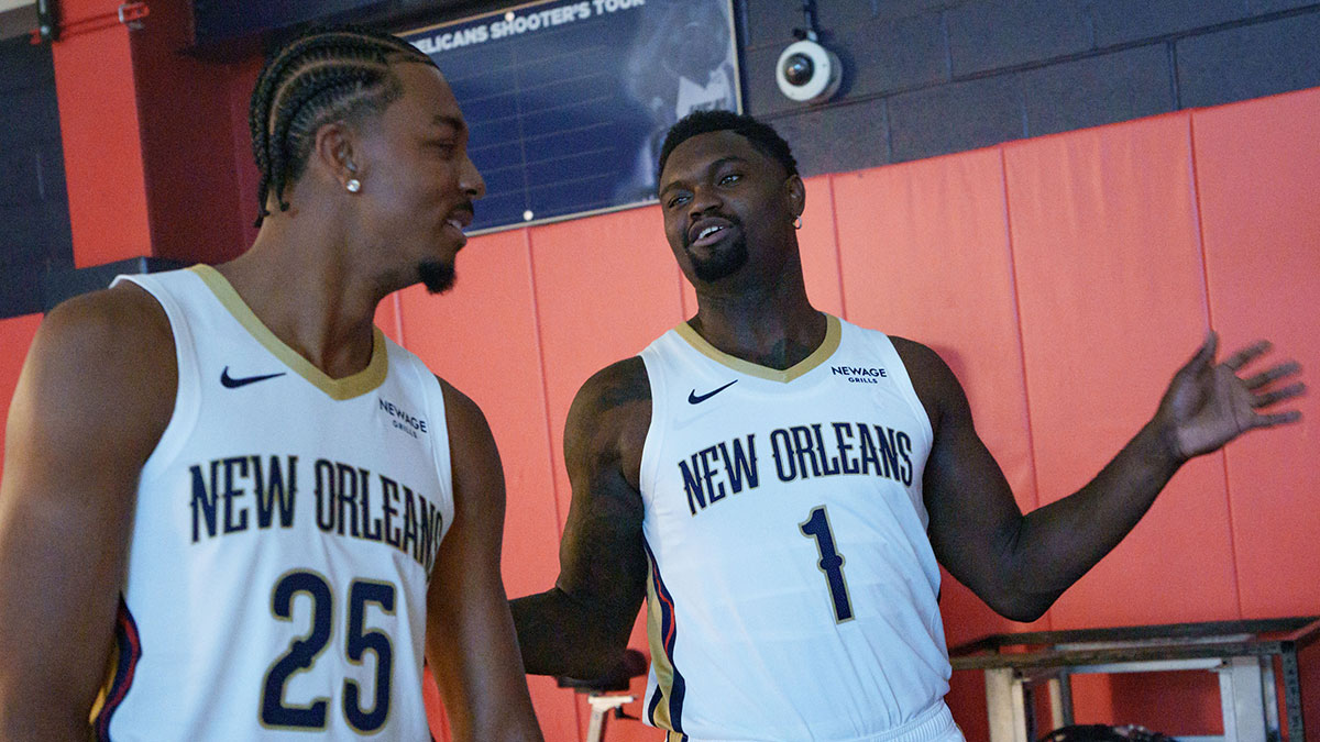 Pelicans guard Trey Murphy III (25), and forward Zion Williamson (1) take part