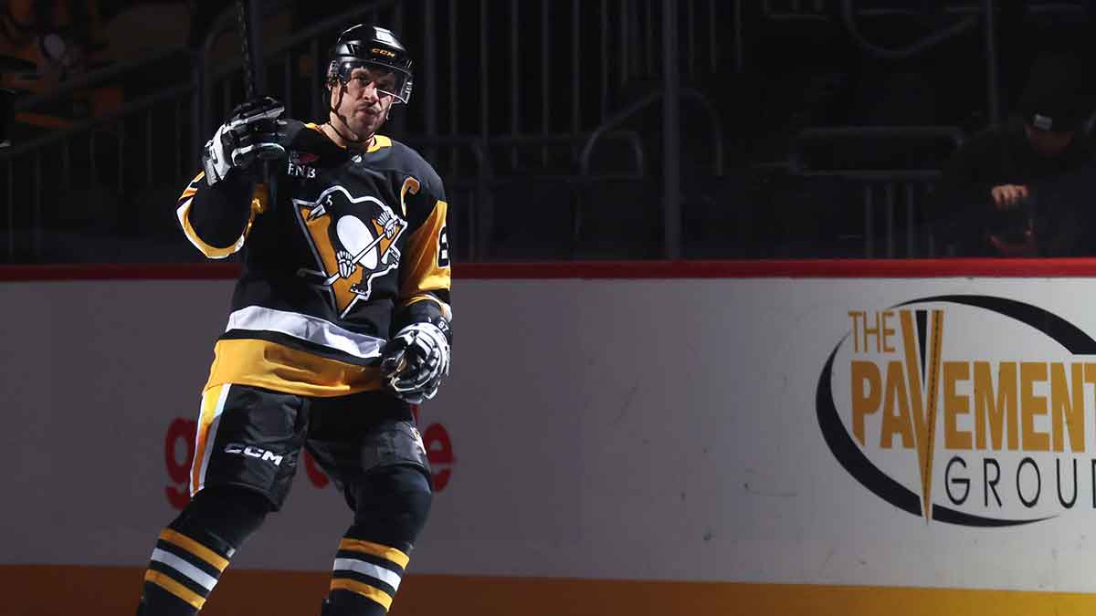 Pittsburgh Penguins center Sidney Crosby (87) reacts after being named a star of the game against the Vancouver Canucks at PPG Paints Arena.