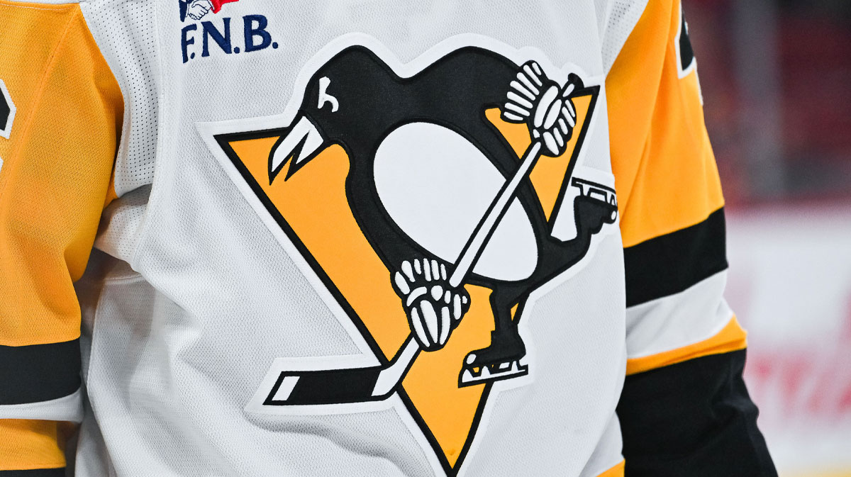 View of a Pittsburgh Penguins logo on a jersey worn by a member of the team during the second period at Bell Centre.