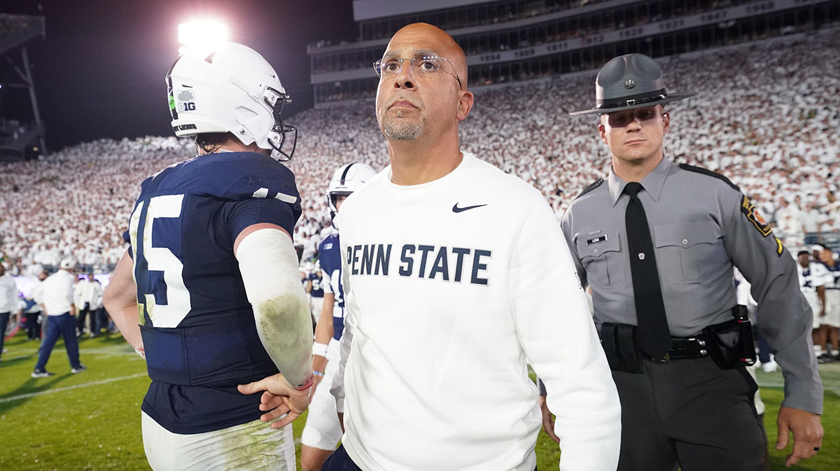 Penn State Nittany Lions head coach James Franklin and quarterback Drew Allar (15) react after losing to the Oregon Ducks at Beaver Stadium.