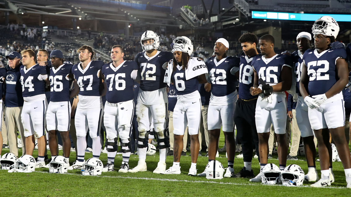 Penn State Nittany Lion players sing their alma mater following the game against the Northwestern Wildcats at Beaver Stadium. Mandatory Credit: Matthew O'Haren-Imagn Images