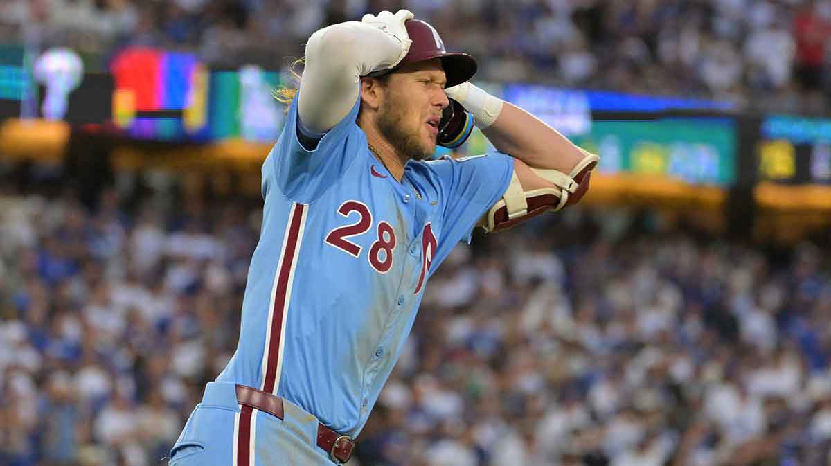 Philadelphia Phillies third baseman Alec Bohm (28) reacts after a long fly ball in the eleventh inning against the Los Angeles Dodgers during game four of the NLDS round for the 2025 MLB playoffs at Dodger Stadium.