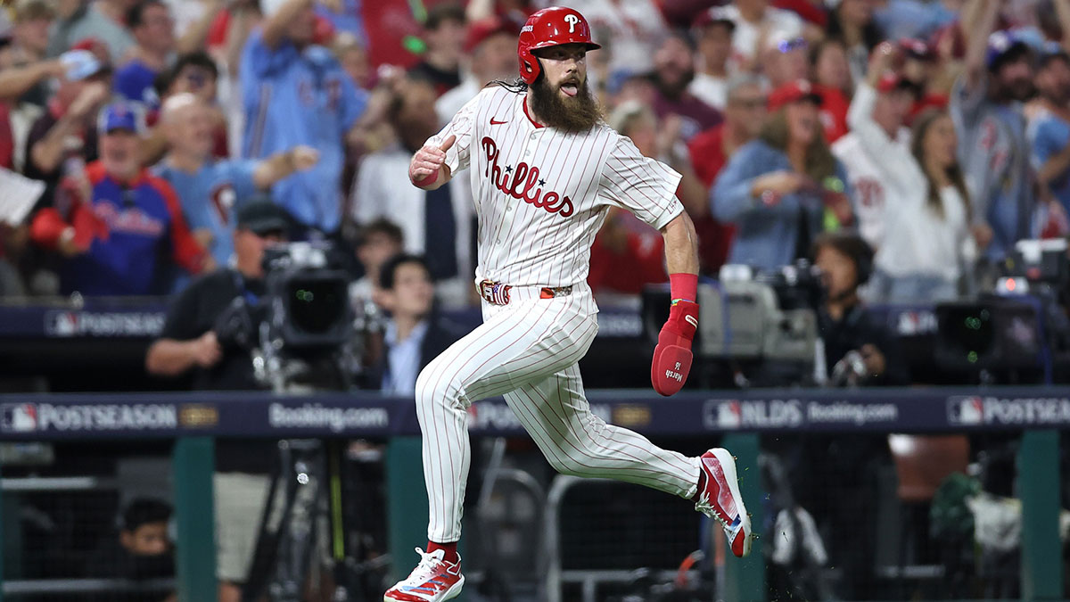 Philadelphia Phillies center fielder Brandon Marsh (16) runs to score against the Los Angeles Dodgers in the second inning during game one of the NLDS round for the 2025 MLB playoffs at Citizens Bank Park.