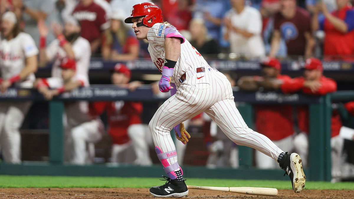 Philadelphia Phillies pinch hitter Harrison Bader (2) hits a single against the Los Angeles Dodgers in the ninth inning during game two of the NLDS round for the 2025 MLB playoffs at Citizens Bank Park.