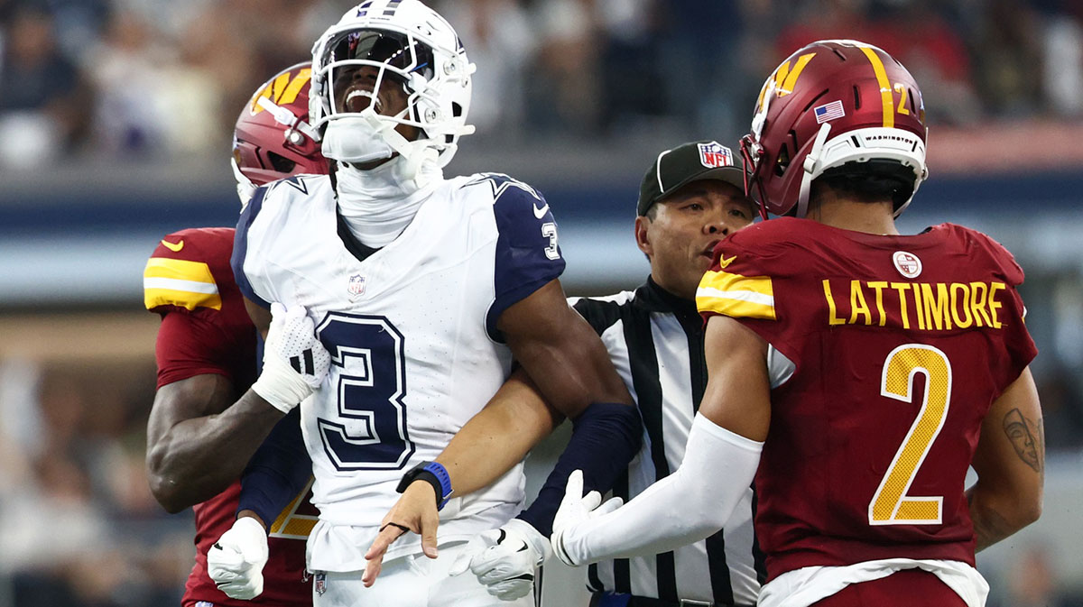 Dallas Cowboys wide receiver George Pickens (3) celebrates after a play as Washington Commanders safety Quan Martin (20) and cornerback Marshon Lattimore (2) look on during the second quarter of the game at AT&T Stadium.
