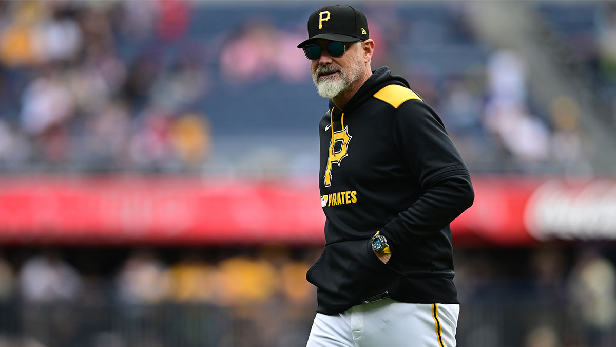 Pittsburgh Pirates manager Derek Shelton (17) walks to the dugout after a pitching change during the fourth inning against the San Diego Padres at PNC Park. Mandatory Credit: